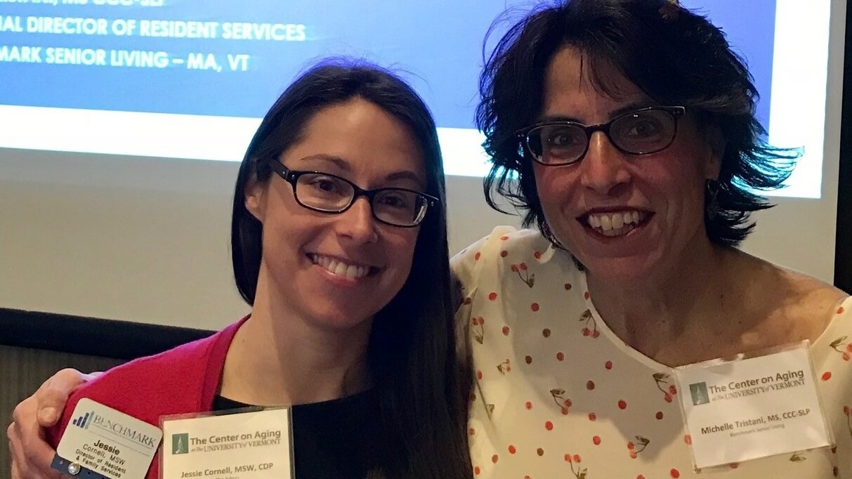 Two women speaking at panel