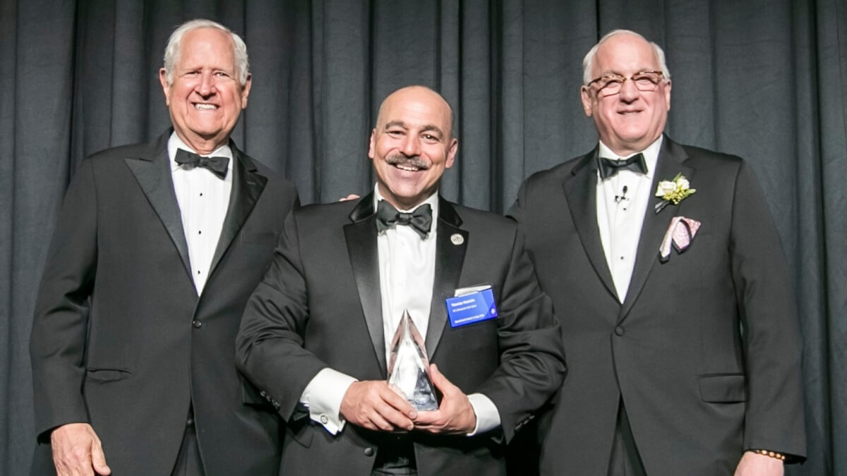 Man receiving award at gala