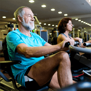 Older man on exercise bike