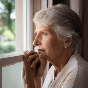 Woman looking out window