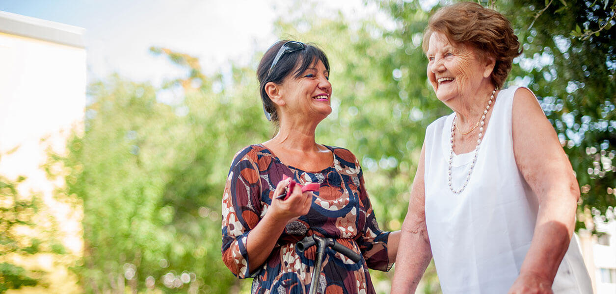 Woman and senior woman outdoors