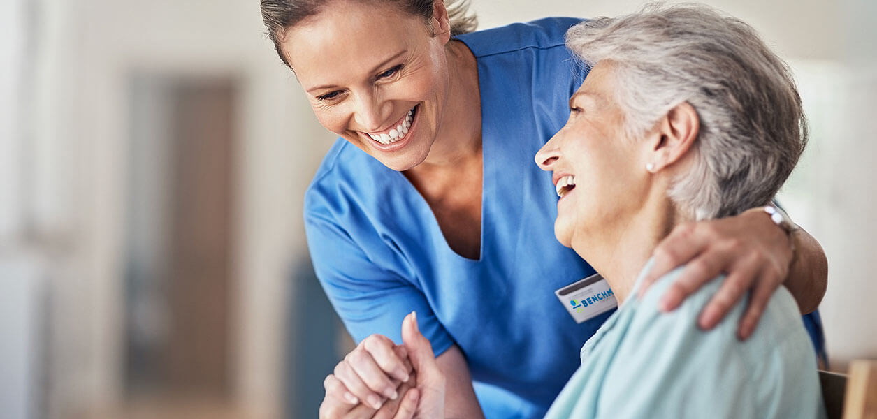 Nurse and woman laughing