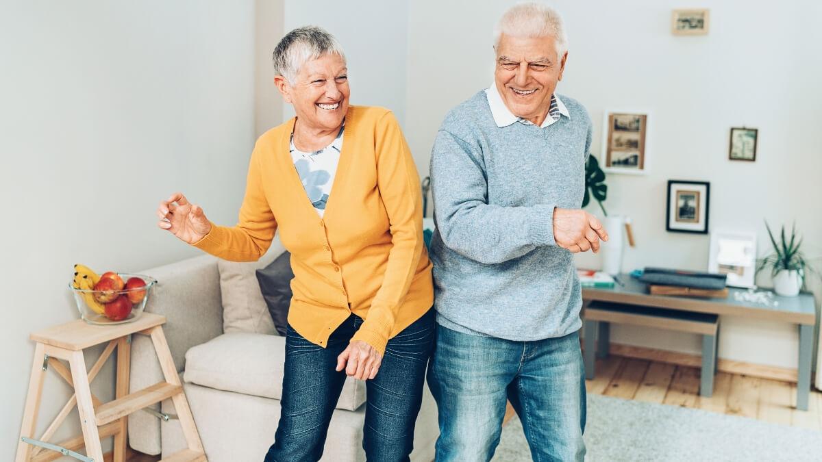 Two seniors dancing