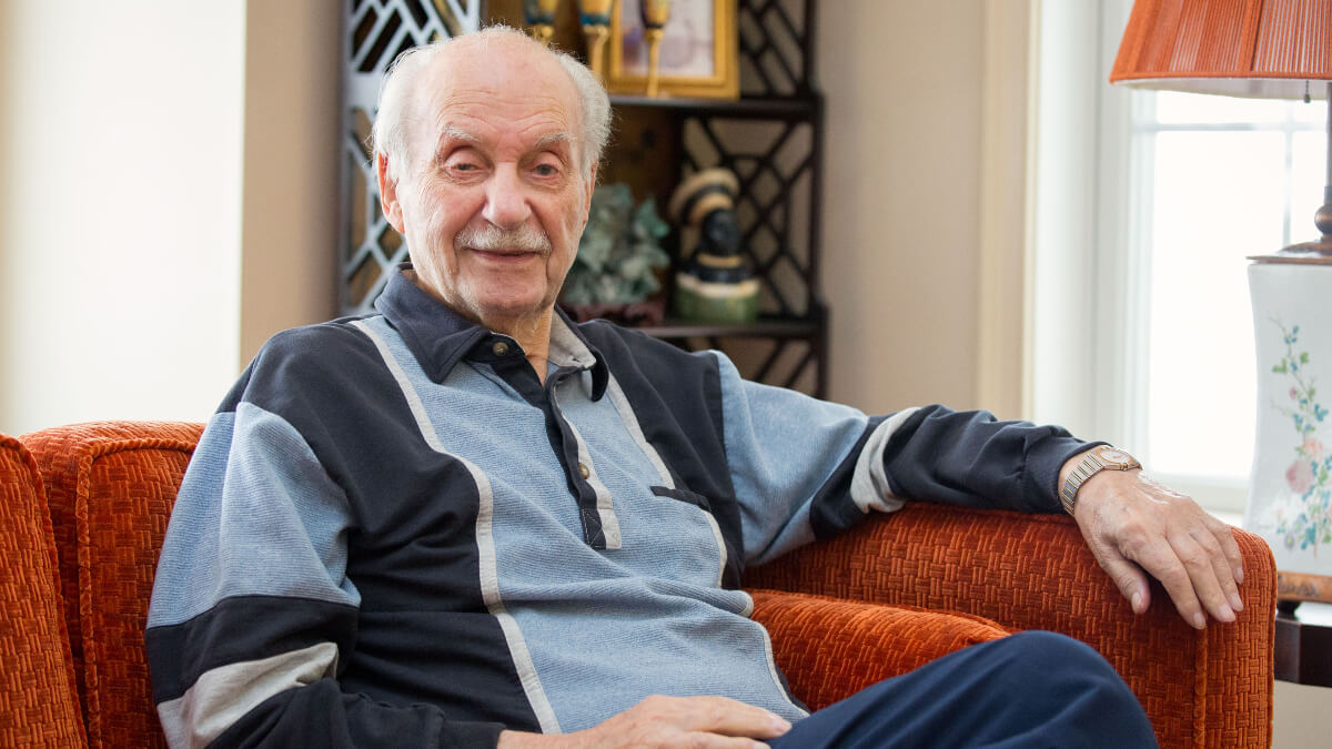 Senior man posing for photo