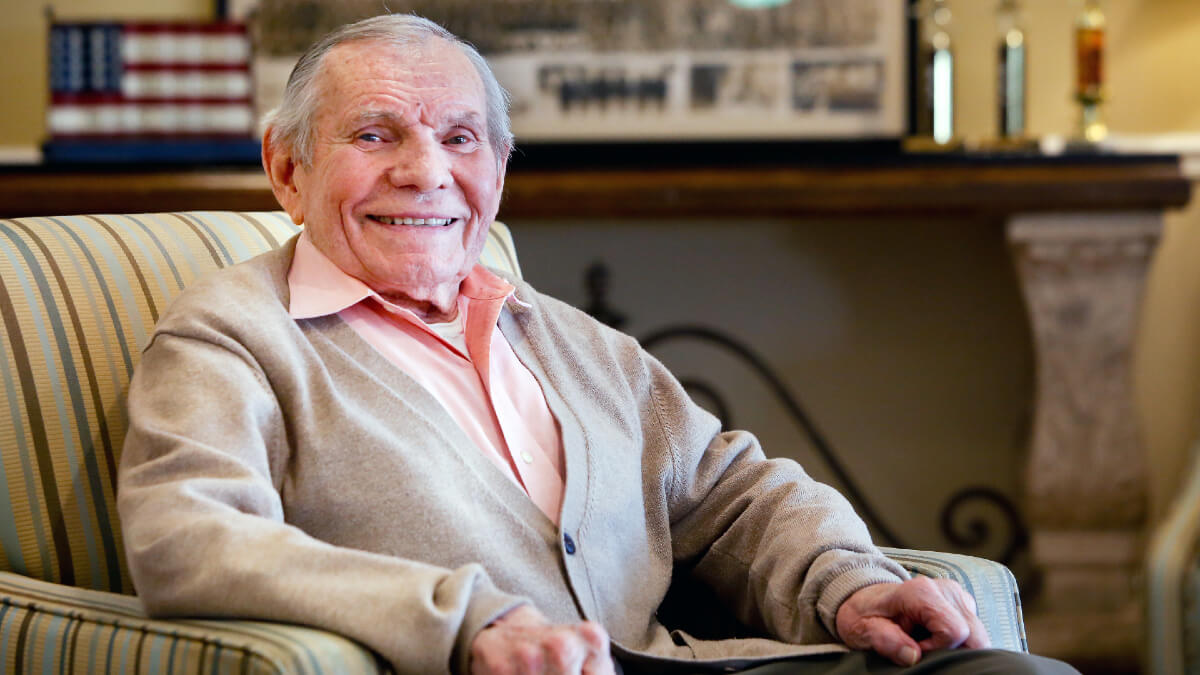 Senior man posing for photo