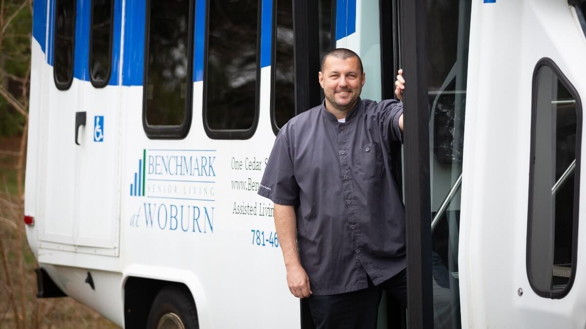 Bus driver posing for photo