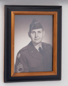 Portrait photo of man in armed services uniform