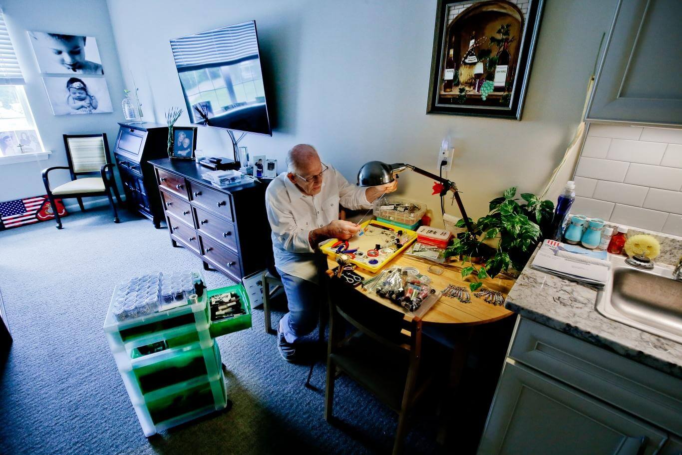 Senior man creating arts and crafts
