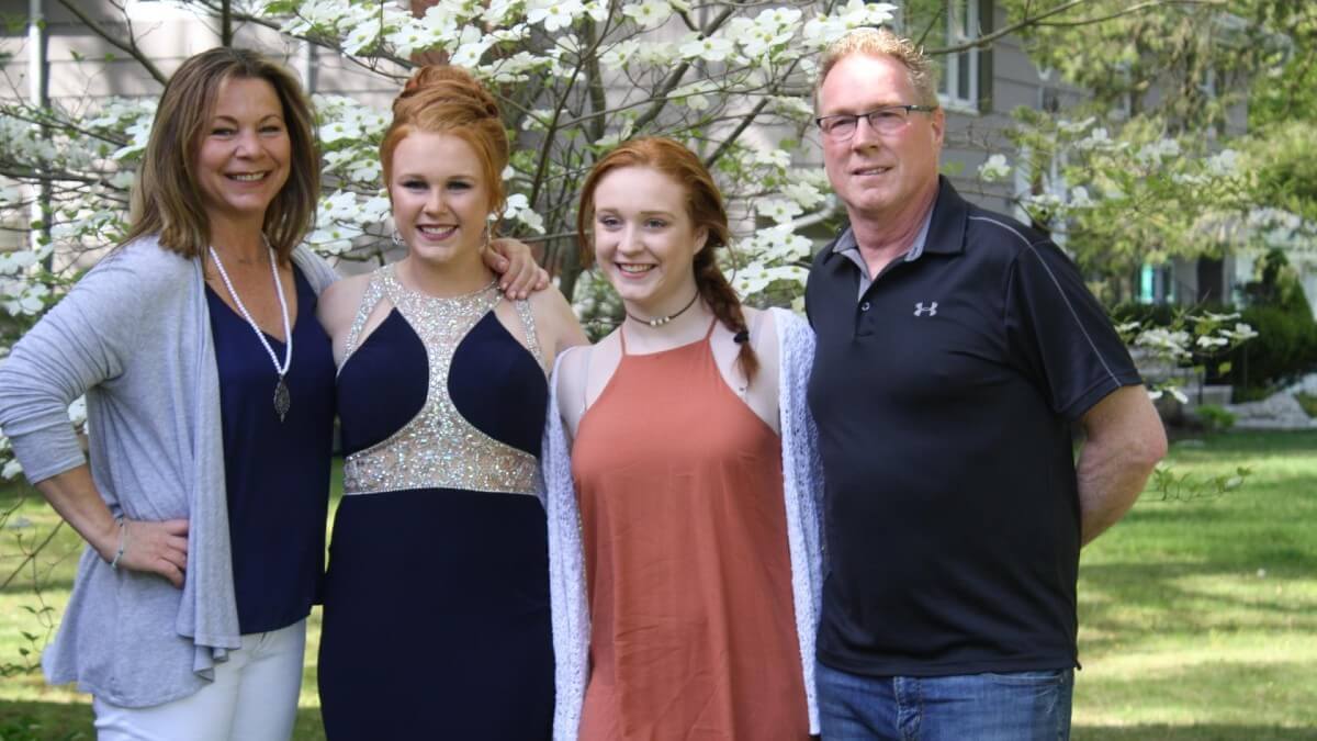 Family posing for prom pictures