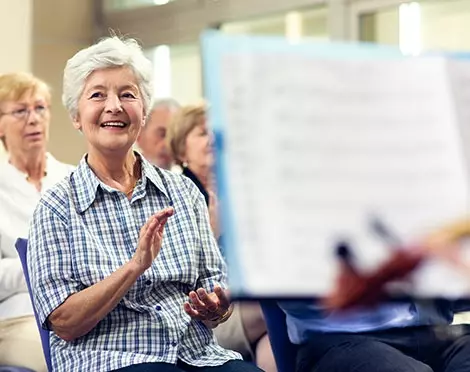 Musician performing in senior living home