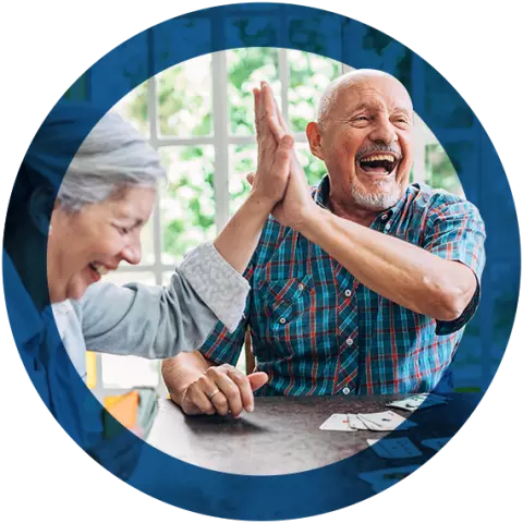Older couple high-fiving