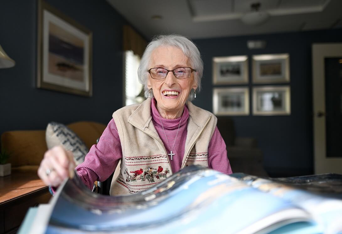 Older woman reading book