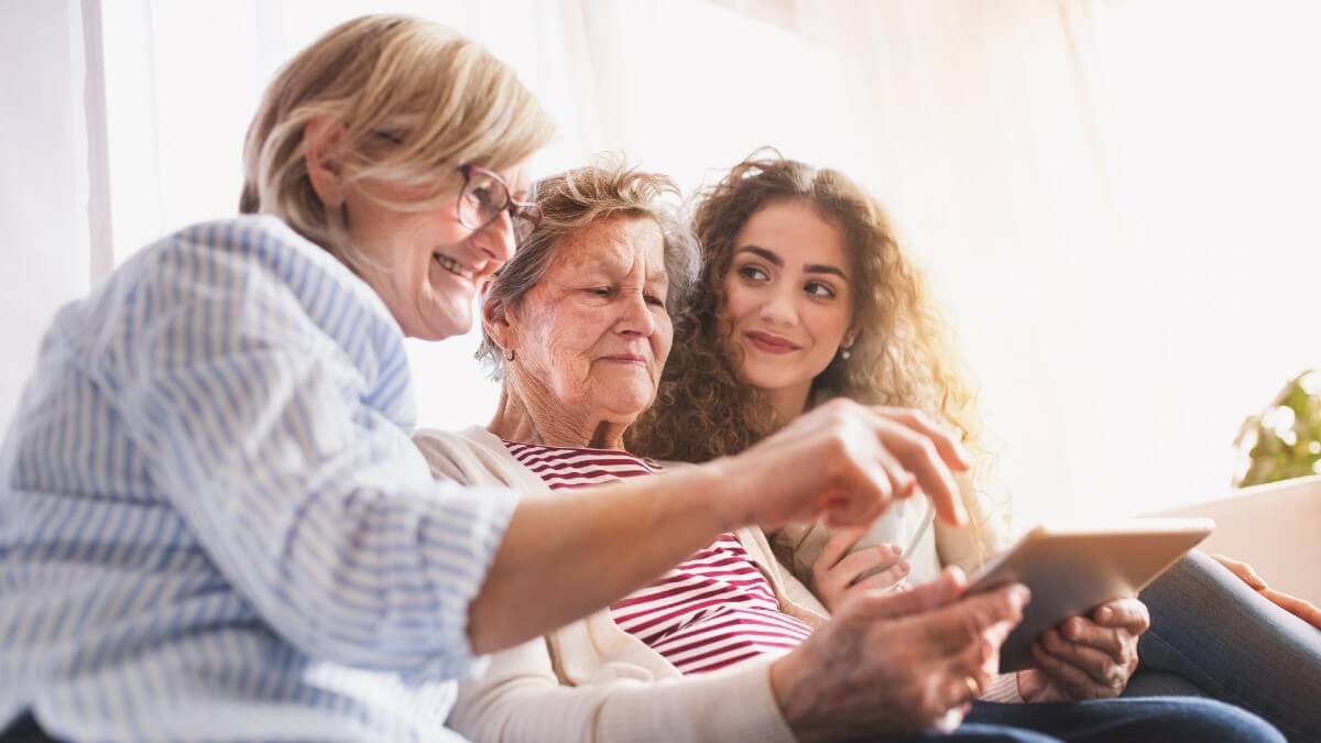 Family looking at tablet