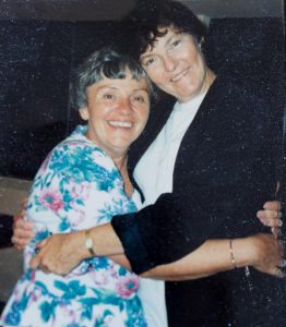 Two women hugging