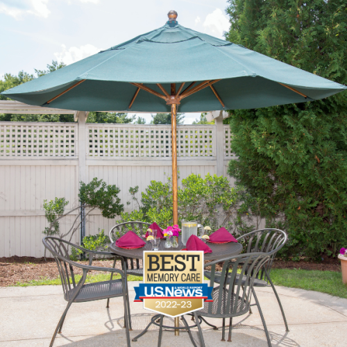 Birches at Concord outdoor patio with table and chairs