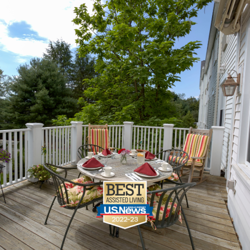 Greystone Farm at Salem outdoor patio table and chairs on deck with beautiful view