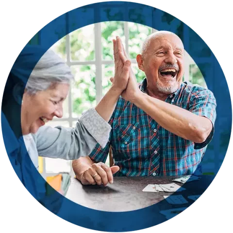 Older couple high-fiving