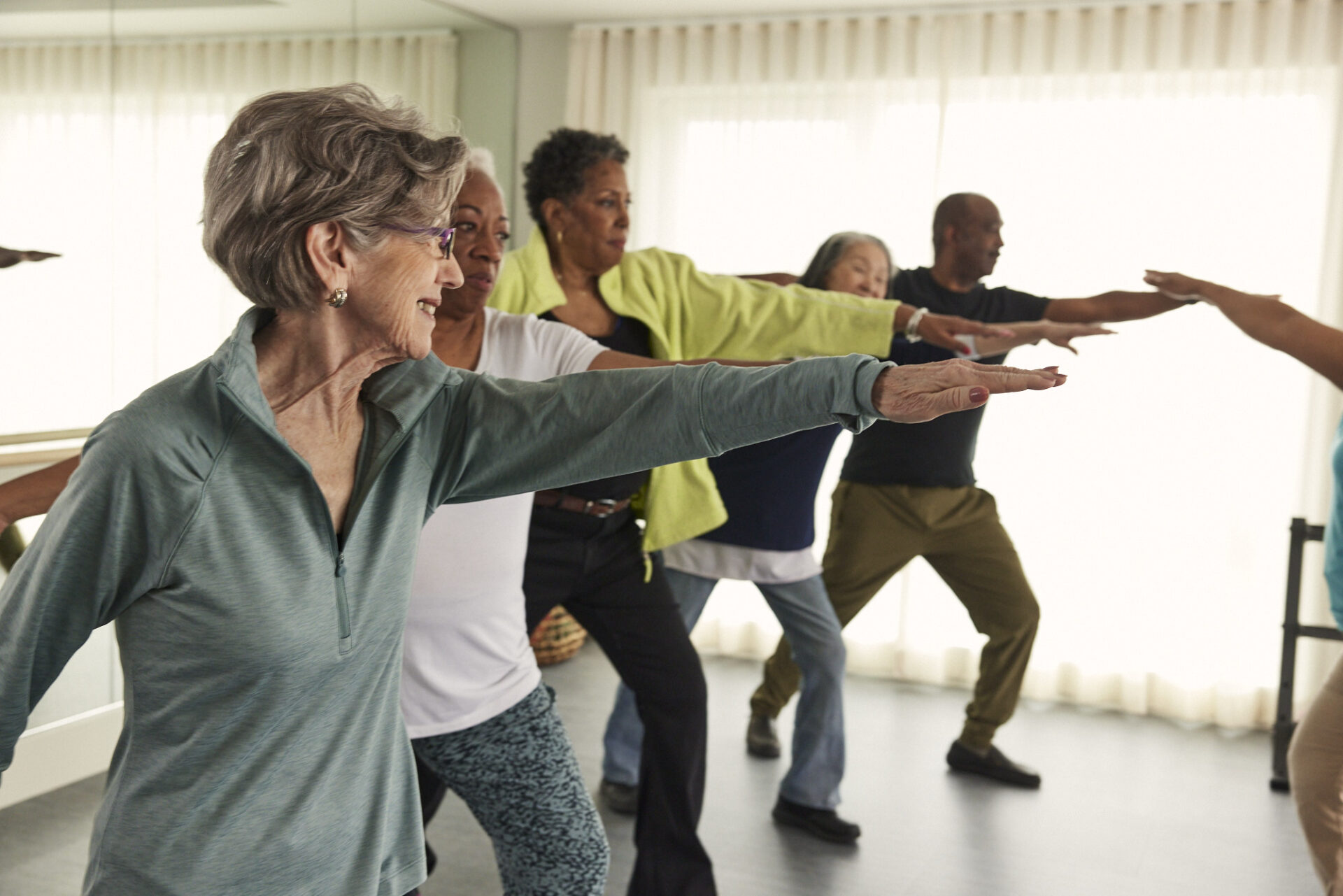 seniors posing in yoga